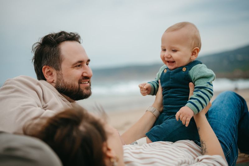 Olga, Andrey & baby boy Timofey: A Family Photoshoot at Guincho Beach. Full photoshoots in Lisbon